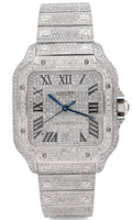 Cartier Santos featuring an extensive pavé-style diamond setting across the dial, bezel, case, and bracelet.